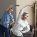 senior couple exercising home