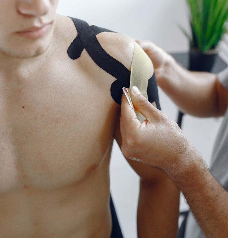 Doctor glues a tepee to an athlete at the hospital